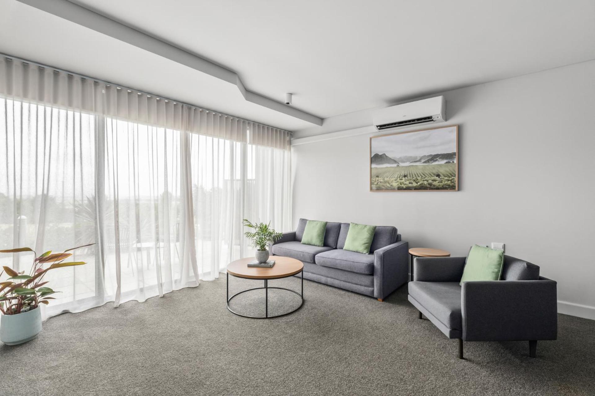 Balgownie Estate Yarra Valley Yarra Glen Buitenkant foto A living room with a split-type air conditioner